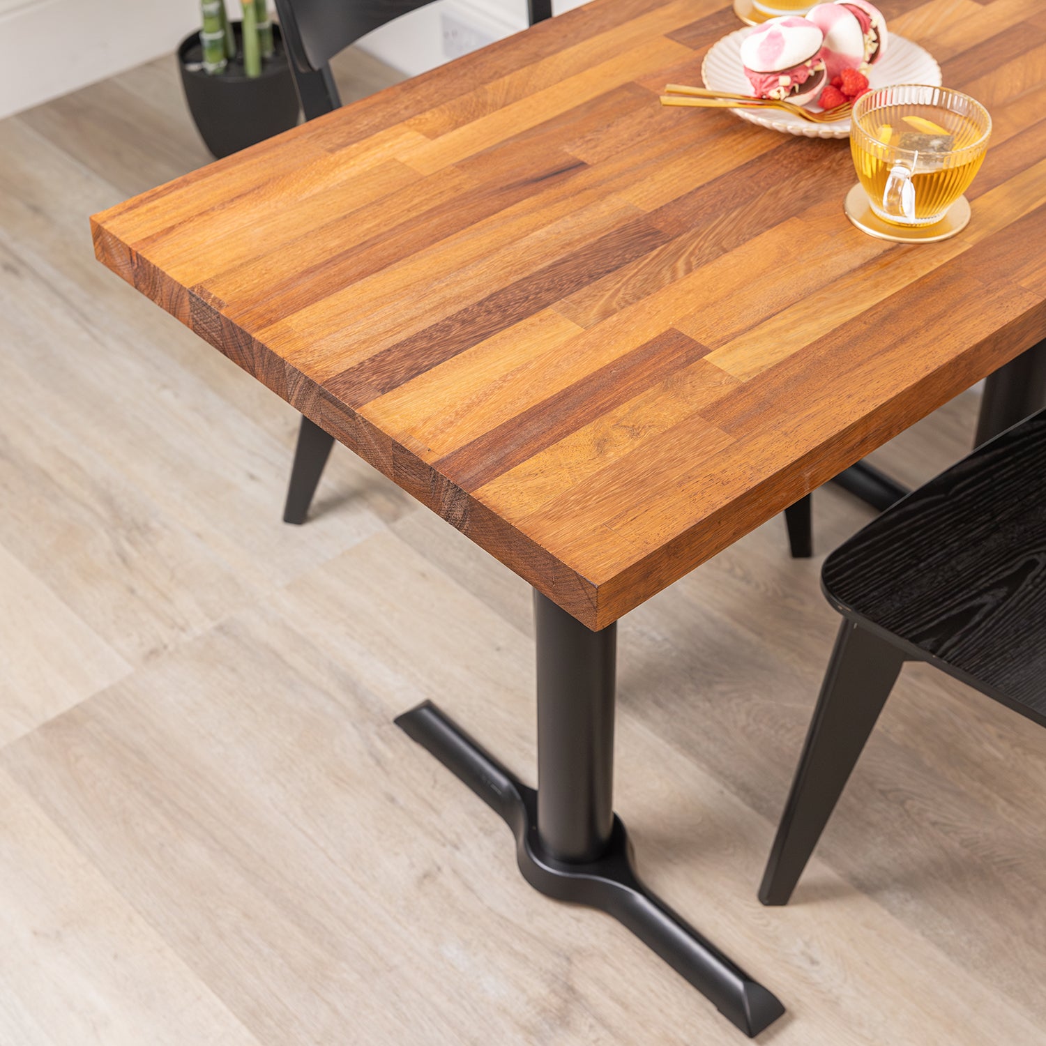 Solid Iroko Table with Black Pedestal Base